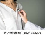 Doctor Is Using A Stethoscope...