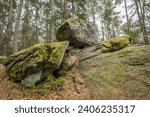 Small photo of Wackelstein Wobble Stone near Thurmansbang megalith granite rock formation in winter in bavarian forest, Germany
