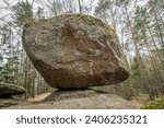 Small photo of Wackelstein Wobble Stone near Thurmansbang megalith granite rock formation in winter in bavarian forest, Germany