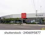 Small photo of facade of Nissan motor company, Nissan logo in front of dealership building, Nissan is a Japanese multinational automobile company. Guadalajara, Jalisco, Mexico, December 28, 2023.