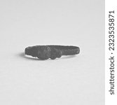 Small photo of An old ring dug up in the ground during a legitimate search.