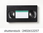 Video cassette tape isolated on white. Old analog tape VHS cassette, close-up. Retro and vintage
