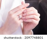 Diamond wedding ring on woman hand