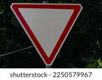 Yield Road Sign With Tree In...