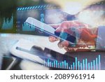 Small photo of Close up of hand holding cellphone with glowing forex chart trading interface on blurry outdoor background. Market, economy and data exchange concept. Double exposure