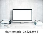 Blank screen on the desktop computer with books and cup of coffee, mock up 3D Render