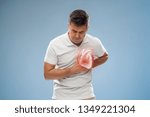 people, healthcare and health problem concept - unhappy middle-aged man having heart attack or heartache over blue background