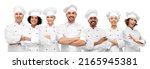 Small photo of cooking, culinary and profession concept - international team of smiling chefs with crossed arms