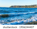 View of the water and point from Seahurst Beach in Burien, Washington.