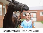 Smiling Veterinarian With Horse ...