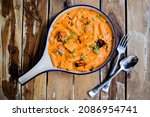 Small photo of Delicious plate of italian food pink sauce pasta with paneer. Selective Focus, Selective Focus on Subject.