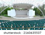 Small photo of Summer theater.Outdoor theater scene.Outdoor summer theater with chairs