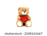 Teddy bear with red heart and text 'I love you' isolated on white background. Concept Valentine's Day.