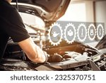 Small photo of Close-up hand auto mechanic using the wrench to repairing car engine problem. Concepts of check and fix car and maintenance servicing.