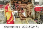Small photo of Lucknow UP 19 June 2022 India: Ration card holders gathers to collect food grains from a state-run ration store, ration shop in Lucknow town Uttarpradesh india. Aisa