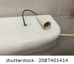 Small photo of toilet with a flush. Press and flush, modified flush