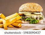 Small photo of Traditional Brazilian burger, very delicious - Hamburguer Good times happen together with a hamburger