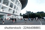 Small photo of Jakarta, Indonesia- January 08, 2023 : Gelora Bung Karno Stadium, Senayan. People doing sport activities around the stadium. Healthy life