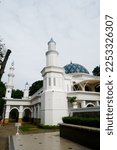 Small photo of Jakarta, Indonesia - January 23, 2023 : Al Bina mosque is strategically located in Senayan with easy access. This beautiful mosque is dominated by blue and the floors are covered in marble.