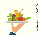 healthy food concept. man holds ... | Shutterstock .eps vector #610488254