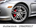Front Wheel and Rim on Silver Porsche