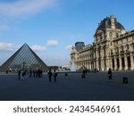 Small photo of October 13, 2007 the Louvre Museum at dusk, is a historical monument and one of the largest and most visited art museums, located on the Rive Droite Seine, 1st Arrondissement in Paris, France.