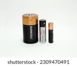 Small photo of Batteries. Alkaline batteries. Single use batteries. Disposable batteries of brands Duracell, Kodak, Energizer. Isolated white. Different sizes AAA, AA, D. Technology. Energy. Battery.