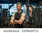Small photo of athletic athlete in fitness gym. athletic athlete in sport gym. sport and fitness. athletic athlete