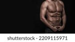 Small photo of muscular torso of man. cropped view of man torso. abdominal and torso banner with copy space.
