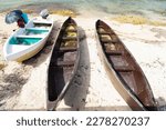 rowboat boat on beach. rowboat boat for summer vacation activity. rowboat boat at the sea.