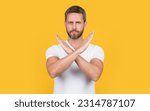 Small photo of man refuse with denial gesture in studio