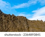 Geological formations in nature. Geology shapes landscapes. volcanic mountain stony rock. Mountain landscape nature. geology concept. geological volcanic rock ridge. Mountain nature environment