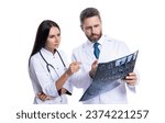 Small photo of Medicine doctor look at mri isolated on white. Doctor analyzing brain scan for damage or disease. healthcare and medicine. medicine concept. doctor hold xray of nuclear medicine. Healthcare provider