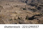 Small photo of The desert, dry and torrid nature of the surroundings of the viewpoint of Ocolle du Perou, walk and walk on a path along the high mountains, ruines Uyu Uyu, several crop fields in a square