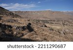 Small photo of The desert, dry and torrid nature of the surroundings of the viewpoint of Ocolle du Perou, walk and walk on a path along the high mountains, ruines Uyu Uyu. Agriculture field on several levels