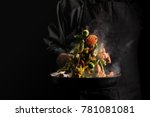 Chef cooking vegetables on a...