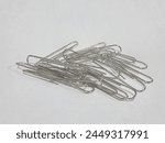 Image of silver paper clip or...