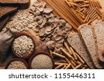 Wooden table full of fiber-rich whole foods, perfect for a balanced diet