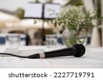 black microphone on ceremony table on wedding day