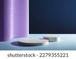 Small photo of Front view of two round empty podiums on dark background. Purple paper folds form a soft undulating wall. Minimal abstract background for display product.