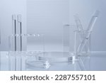 Small photo of Science and medical background with transparent round podium, lab glassware filled colorless liquid and ribbed acrylic sheets decorated on white background. Space for products presentation