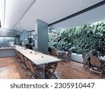 Small photo of SHANGHAI, CHINA -May 20. 2023:The green walls of the coffee shop and bar, fresh color collocation, very elegant.
