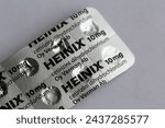 Small photo of Espoo, Finland - April 2020: Heinix pills - cetirizine antihistamin medications used to treat pollen allergy and other allergies. Drugs relieving allergy symptoms efficiently. Closeup color image.