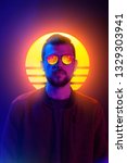 Small photo of 80s sci-fi futuristic fashion poster style violet neon. Retro wave synth vapor wave portrait of a young man in sunglasses.