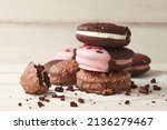 Small photo of American whoopie pie desserts on white wooden planks