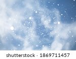 blue snowfall bokeh background  ... | Shutterstock . vector #1869711457