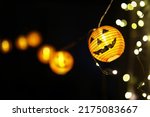 The concept of light on the night Halloween.Round lamp shape of pumpkin used to decorate with copy space for text.