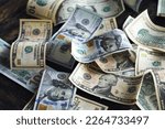 Small photo of Money, US dollar bills background. Money scattered on the desk. Photography for Finance concepts.