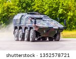 German armoured carrier, from german army, drives on a road