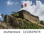 Small photo of French flag on a top of Fort Saint Louis in Fort-de-France, France's Caribbean overseas department of Martinique, Lesser Antilles, French West Indies